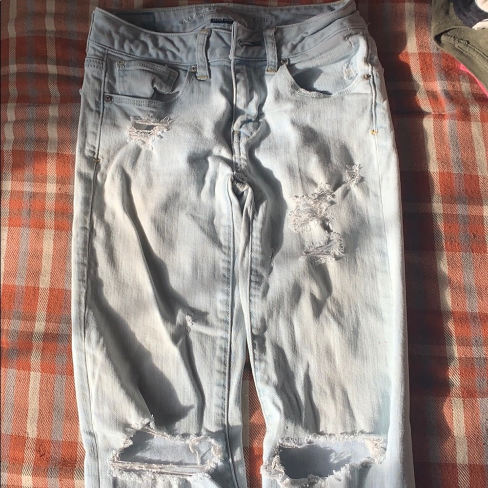 Light Wash A&E ripped Jeans